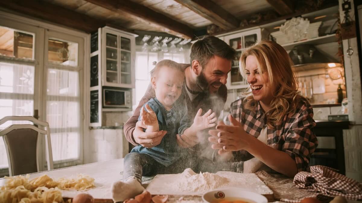 family preparing pasta